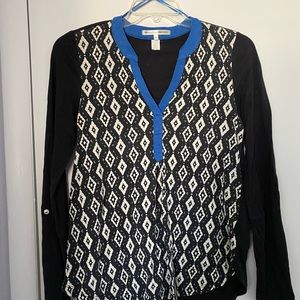 Organic cotton tunic-style top, long sleeves rolled up with tab.  No flaws.